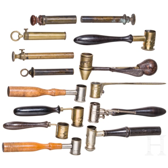 A set of fourteen English powder measures, circa 1800