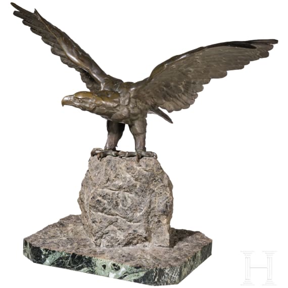 A large eagle on stone pedestal
