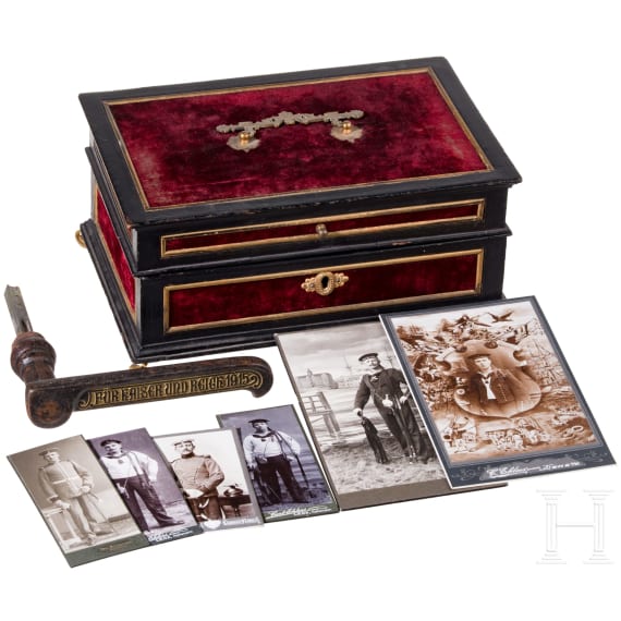 A patriotic door handle and a box with photos