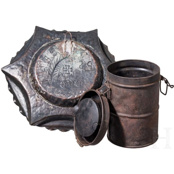 A gas mask can and a patriotic plate