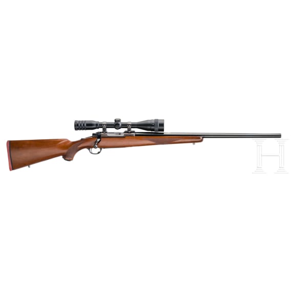 A Ruger Mod. M 77, with scope