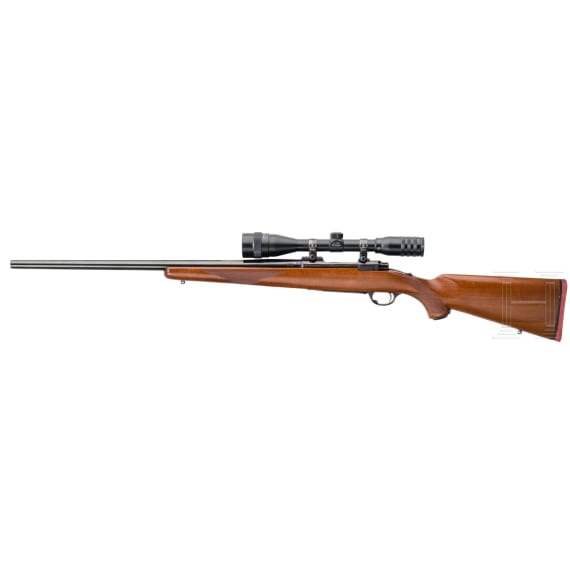 A Ruger Mod. M 77, with scope