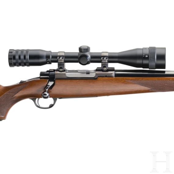 A Ruger Mod. M 77, with scope