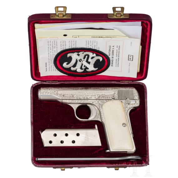 An FN Mod. 1910, factory engraved, nickel-plated, in leather case