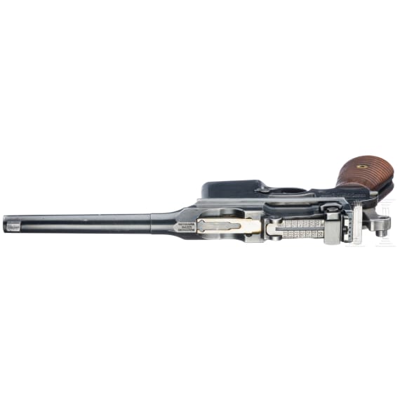 A Mauser Mod. C96 1932 ("Mod. 712"), with shoulder stock and leather harness