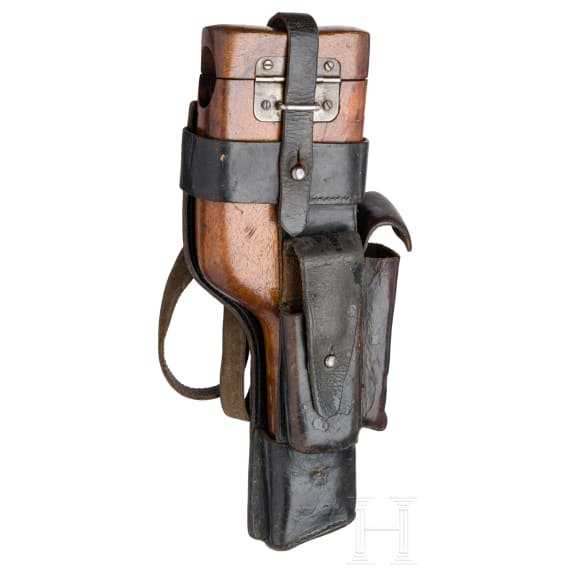 A Mauser Mod. C96 1932 ("Mod. 712"), with shoulder stock and leather harness