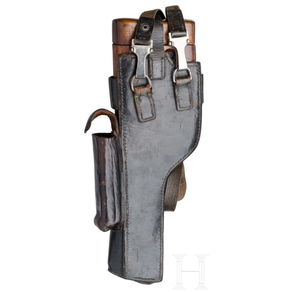 A Mauser Mod. C96 1932 ("Mod. 712"), with shoulder stock and leather harness