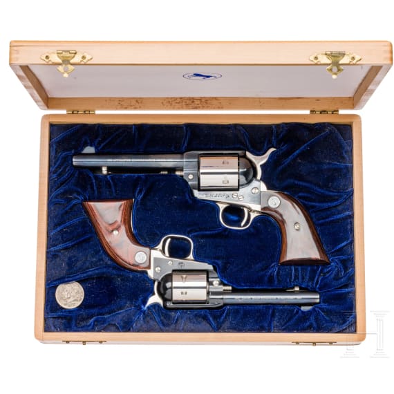 A pair of Colt revolvers - an SAA in .45LC and an SA Frontier Scout in .22lr., Commemorative, in case