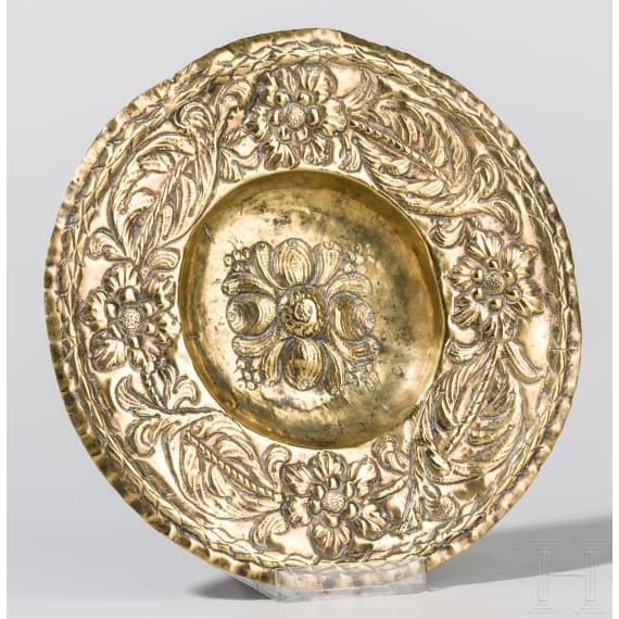 A brass sideboard dish with flowers, German/Dutch, 2nd half of the 17th century