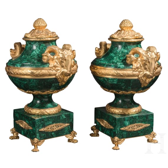 A pair of monumental malachite and ormolu-mounted vases with rams