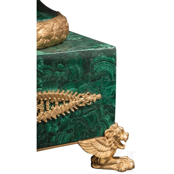 A pair of monumental malachite and ormolu-mounted vases with rams