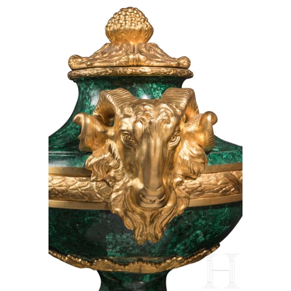 A pair of monumental malachite and ormolu-mounted vases with rams