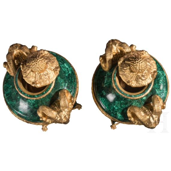 A pair of monumental malachite and ormolu-mounted vases with rams
