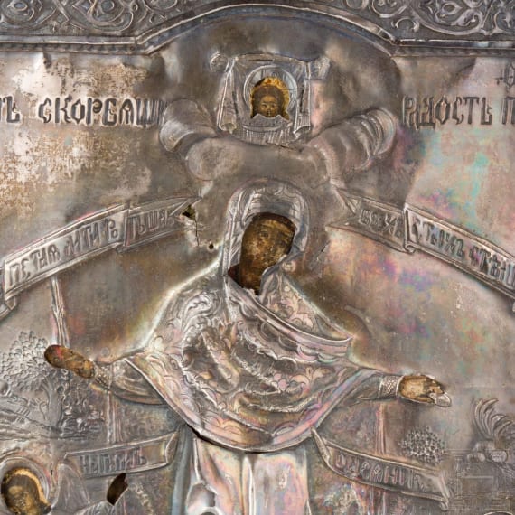 An icon showing the Mother of God "Joy to all who grieve" with silver oklad, Russia, 19th century