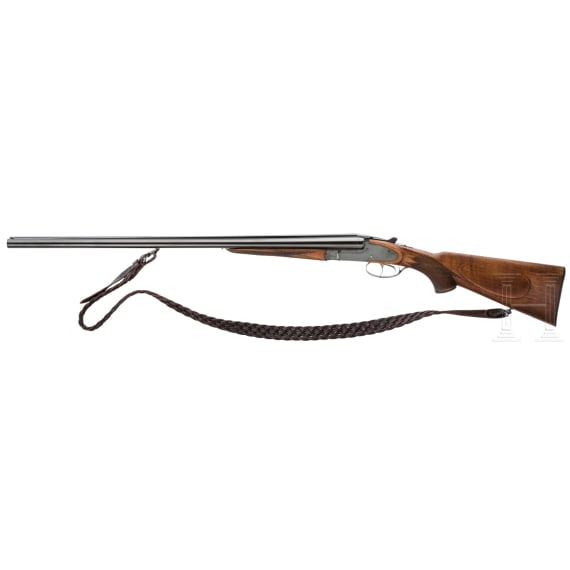 a double-barrel side.by-side shotgun CZ .16/70