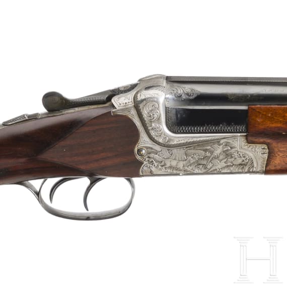 An over and under shotgun by Hubertus, Suhl
