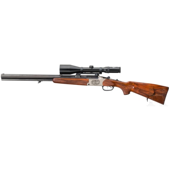 A Combination Rifle by Blaser, with scope
