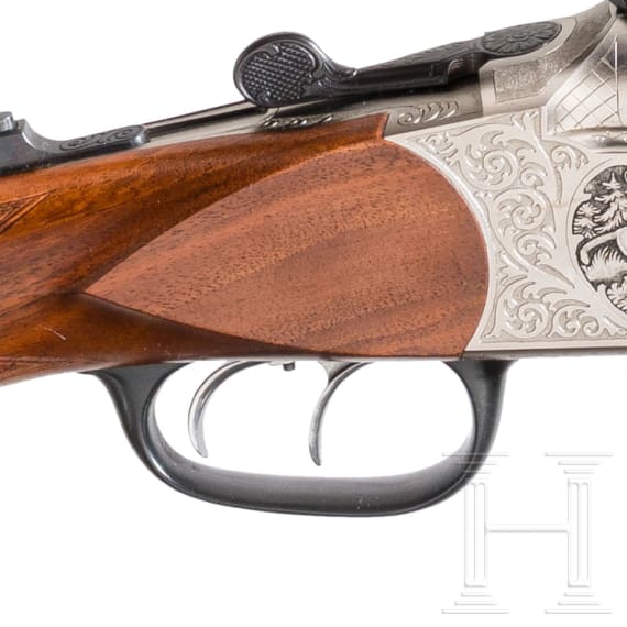 A Combination Rifle by Blaser, with scope