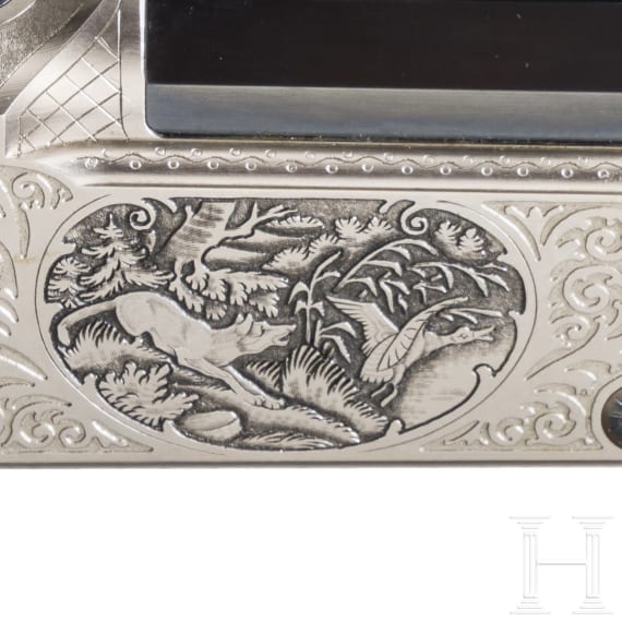 A Combination Rifle by Blaser, with scope