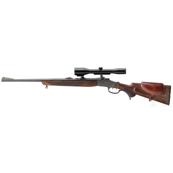 A falling block rifle .22 Hornet