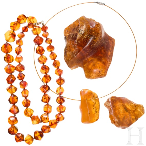 An amber necklace, an amber pendant and two amber chunks