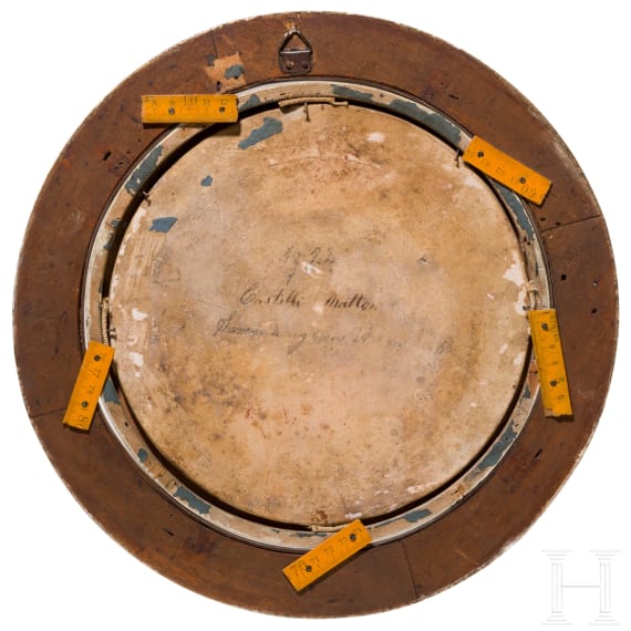 A framed Castelli Maiolica circular plate, circa 1750