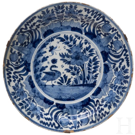 Five flower vase and swan pattern chargers, Delft, early 18th century (four) / circa 1800 (one)