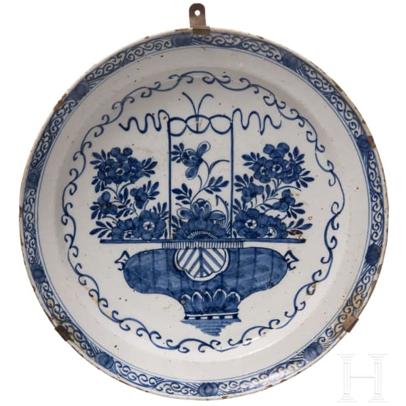 Five flower vase and swan pattern chargers, Delft, early 18th century (four) / circa 1800 (one)