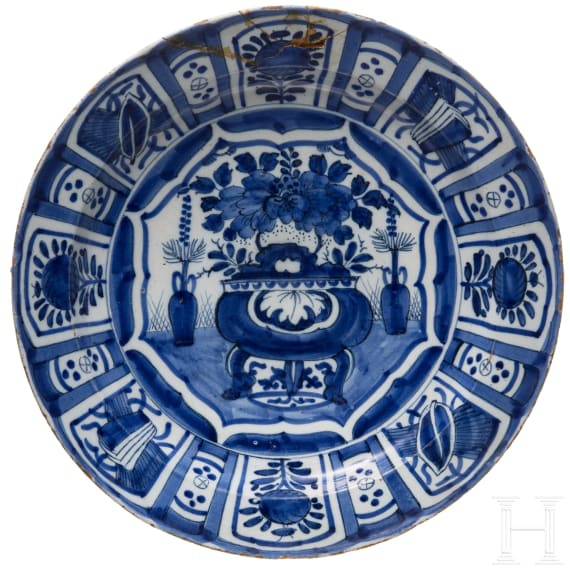 Five flower vase and swan pattern chargers, Delft, early 18th century (four) / circa 1800 (one)