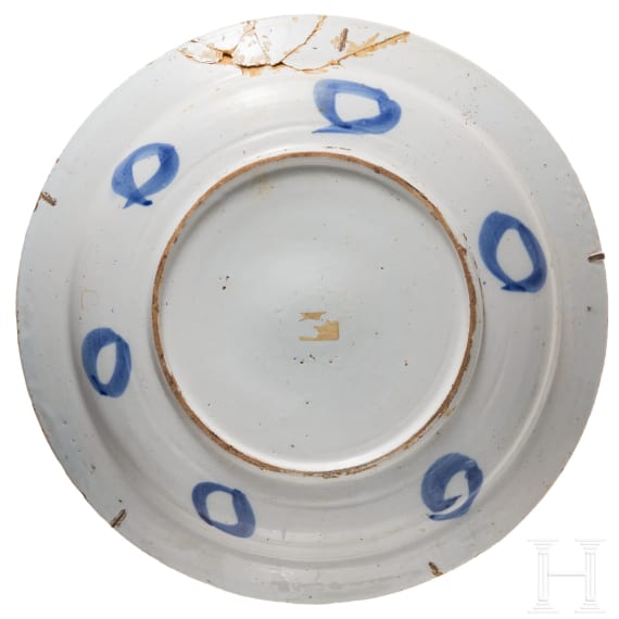 Five flower vase and swan pattern chargers, Delft, early 18th century (four) / circa 1800 (one)