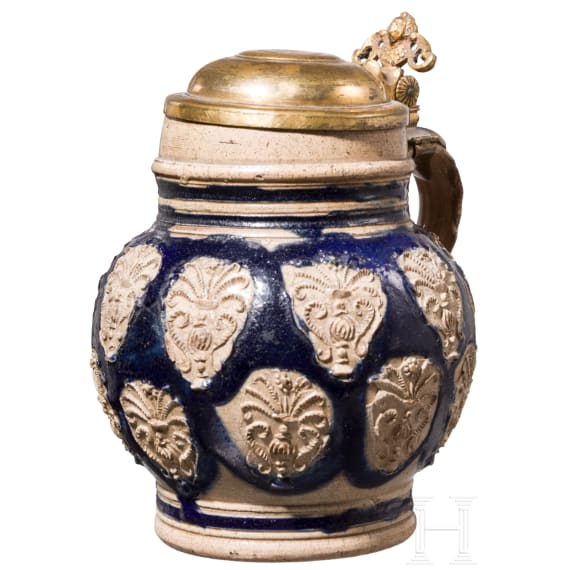 A small Westerwald stoneware jug with fire gilt lid, 17th century