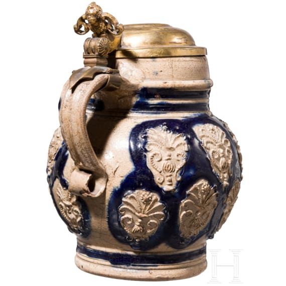 A small Westerwald stoneware jug with fire gilt lid, 17th century