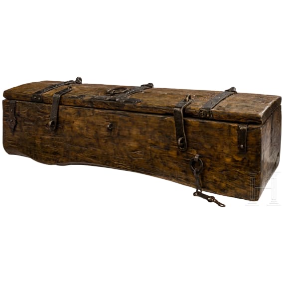 A Rhenish late Gothic trunk carved from a single tree, 15th century