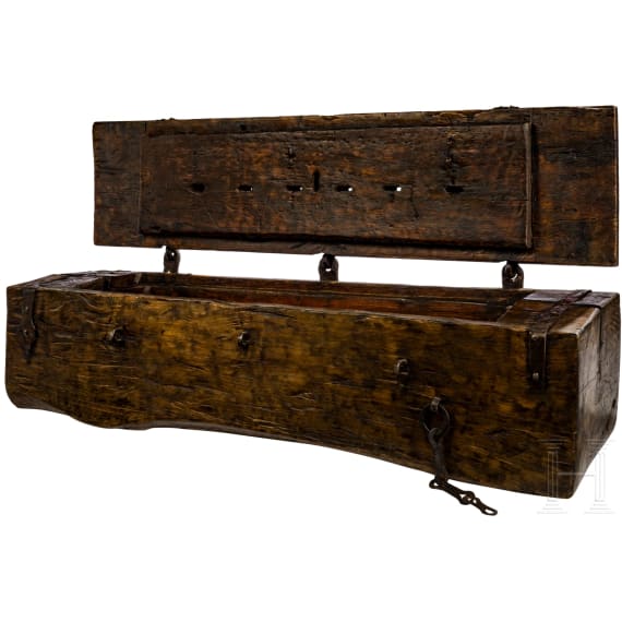 A Rhenish late Gothic trunk carved from a single tree, 15th century
