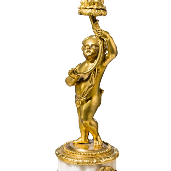A pair of Louis XVI style five-light candelabra with putti, late 19th/early 20th century