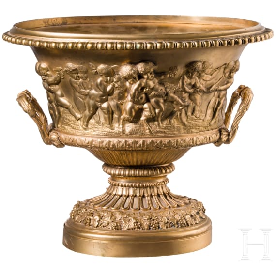 A centerpiece with putti frieze, France, probably late 19th century, cast brass with gilt-coloured finish