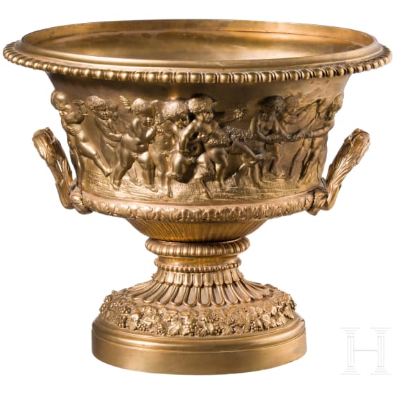 A centerpiece with putti frieze, France, probably late 19th century, cast brass with gilt-coloured finish