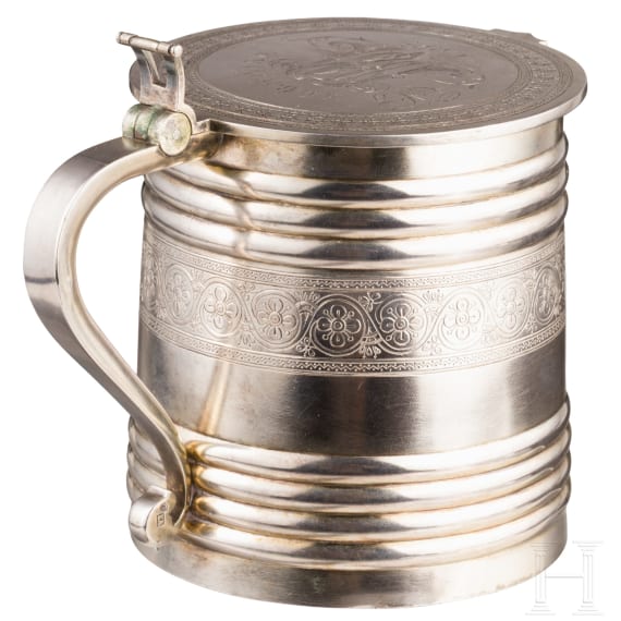 A Russian pan-slavic style parcel-gilt silver tankard, Moscow, V. Aikmov, 1892