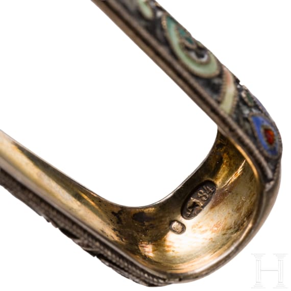A trompe l'oeil sugar tong and a cloisonn&eacute;-enamel sugar tong, Russia, St. Petersburg, Grachev, 1886 / Moscow, 1908&ndash;1917