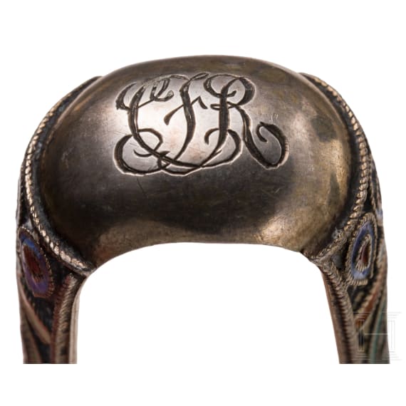 A trompe l'oeil sugar tong and a cloisonn&eacute;-enamel sugar tong, Russia, St. Petersburg, Grachev, 1886 / Moscow, 1908&ndash;1917