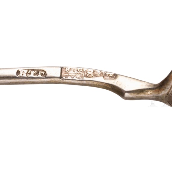 A silver sugar tongs and six spoons, Russia, 1865-1908