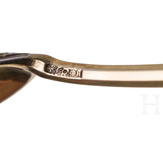 A silver and niello tea glass holder and spoon with Kremlin and another plated tea glass holder, Russia, Moscow, 1875/circa 1880/late 19th century