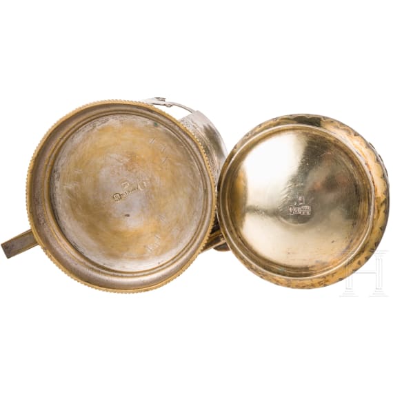 A silver and niello tea glass holder and spoon with Kremlin and another plated tea glass holder, Russia, Moscow, 1875/circa 1880/late 19th century