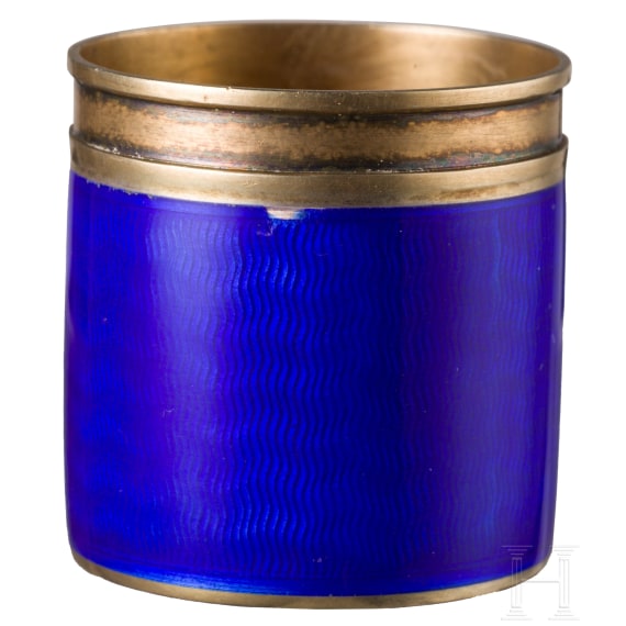 A Russian silver-gilt and guilloch&eacute;-enamel miniature cup (vodka beaker), stamped St. Petersburg, Faberg&eacute;, workmaster Anders Nevalainen, 1908