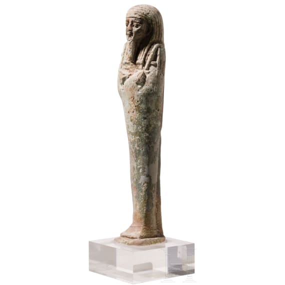 Ushabti made of green faience with hieroglyphic inscription on the reverse, Late Period, mid-1st millennium B.C.
