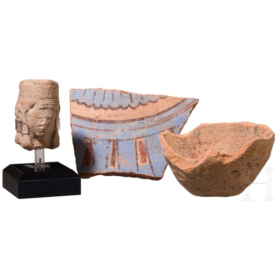 Two fragments of ancient Egyptian pottery and a clay head in Egyptian style from the eastern Mediterranean region, ca. 1350 B.C. &ndash; 6th century B.C.