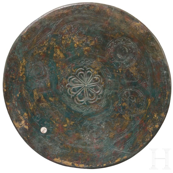 Bronze base of a candlestick, entirely chased with floral and figurative motifs, as well as inscriptions; Seljuk, 12th&ndash;13th centuries