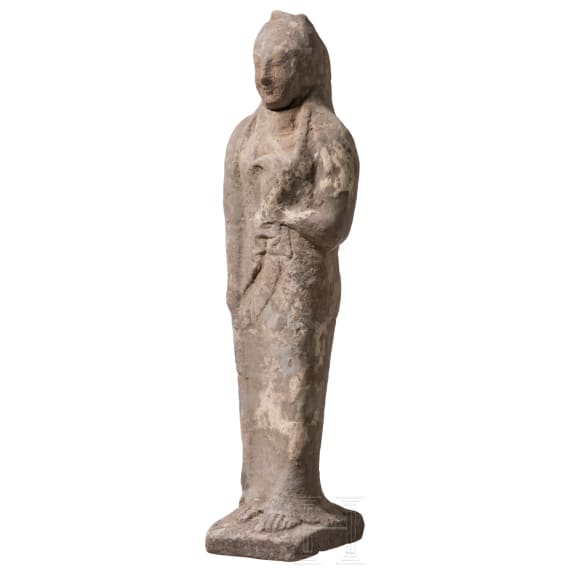 Ointment jar in the shape of a girl with a dove, from southern Italy, modeled after an Eastern Greek design, circa 500 B.C.