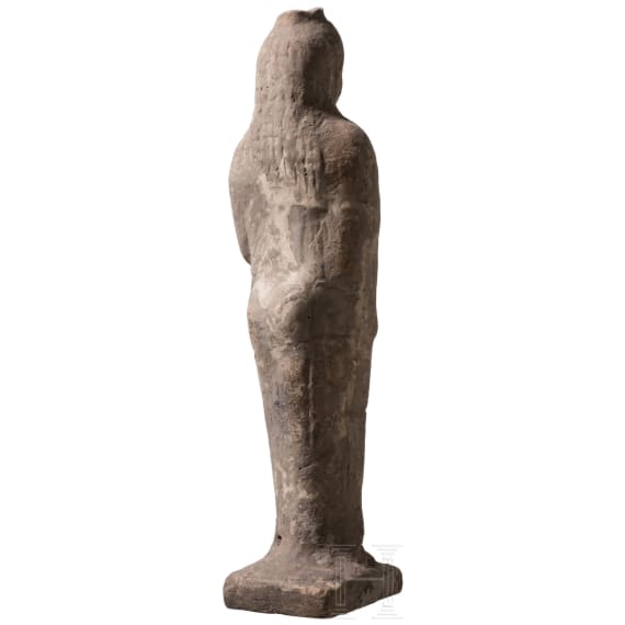 Ointment jar in the shape of a girl with a dove, from southern Italy, modeled after an Eastern Greek design, circa 500 B.C.