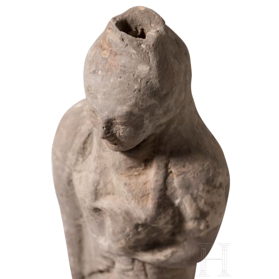 Ointment jar in the shape of a girl with a dove, from southern Italy, modeled after an Eastern Greek design, circa 500 B.C.